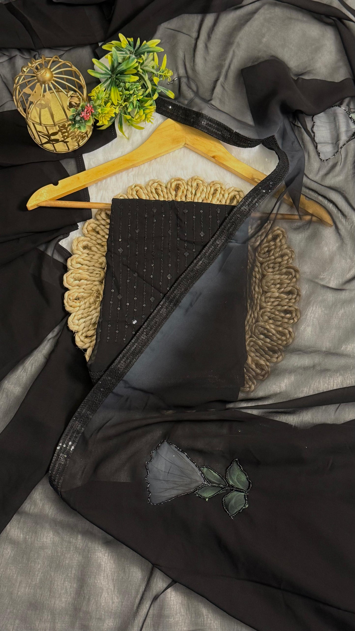 Elegant Black saree With flower pattern and Beads Work