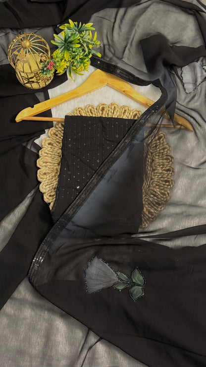 Elegant Black saree With flower pattern and Beads Work