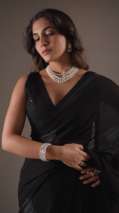 Elegant Black saree With flower pattern and Beads Work